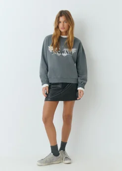 Falda mini efecto piel tachas*Brownie Sale