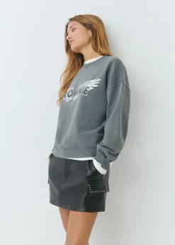 Falda mini efecto piel tachas*Brownie Sale